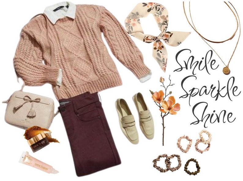May include: A pink cable knit sweater, burgundy jeans, beige loafers, a floral scarf, a beige crossbody bag with tassels, a gold necklace with a circular pendant, and four brown scrunchies. The text "Smile Sparkle Shine" is written in black cursive.