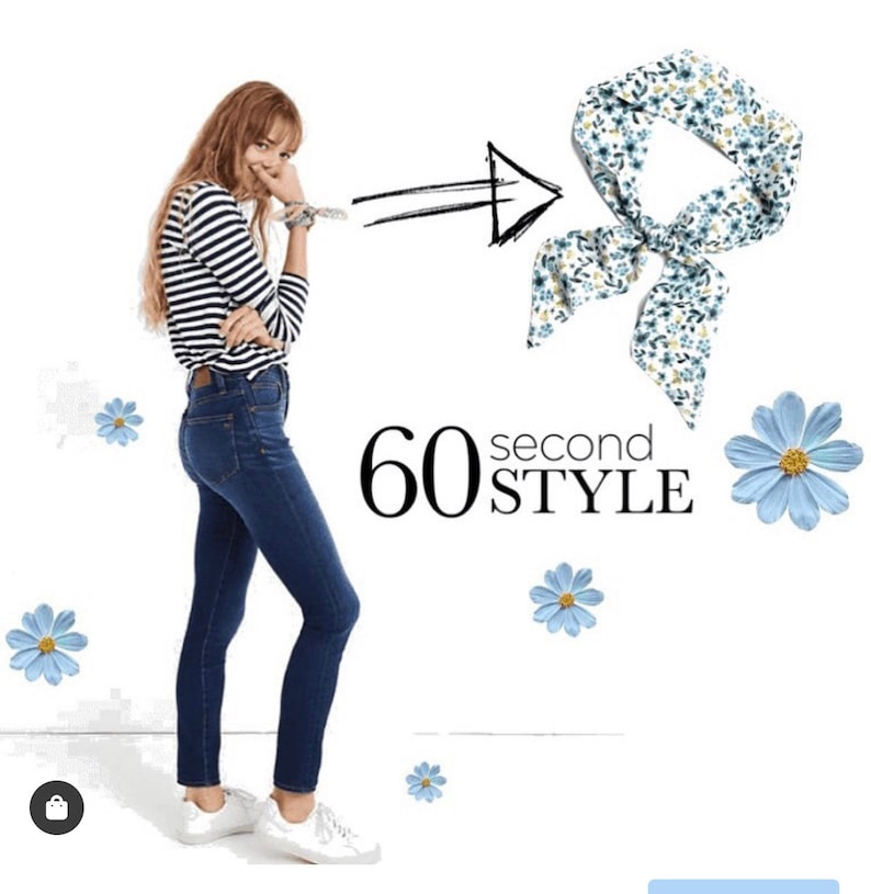 May include: A woman wearing a striped shirt and blue jeans is looking at a floral patterned scarf. The text "60 second STYLE" is in the image.