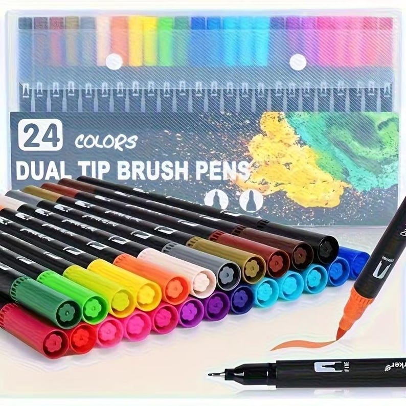 May include: A collection of 24 dual-tip brush pens in a clear plastic case. The pens are arranged to display a range of colours, including red, orange, yellow, green, blue, and purple. The packaging reads "24 Colors Dual Tip Brush Pens."