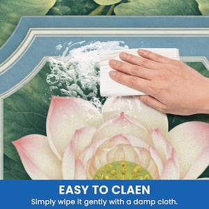 May include: A hand wipes a surface with a white cloth, creating suds. The surface features a floral design with a lotus flower in shades of pink and green. The text "EASY TO CLEAN" is visible at the bottom.