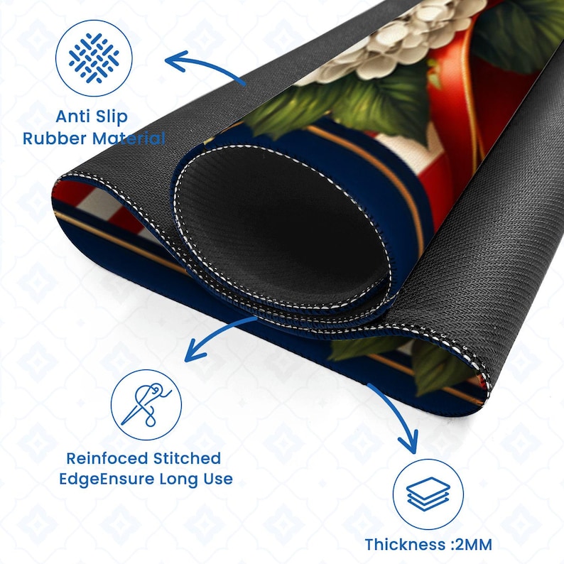 May include: A rolled-up mousepad with a floral design, featuring white flowers, red stripes, and a blue background. The mousepad has a black, anti-slip rubber base and reinforced stitched edges. The thickness is 2mm.