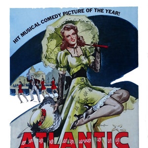 May include: A vintage movie poster for the musical comedy film "Atlantic City" starring Constance Moore and Brad Taylor. The poster features a woman in a yellow dress holding a parasol, with a cityscape in the background. The text "HIT MUSICAL COMEDY PICTURE OF THE YEAR!" is at the top of the poster.