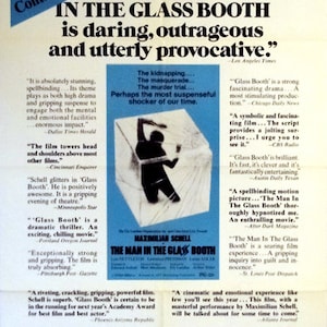 May include: A vintage movie poster for the film "The Man in the Glass Booth" starring Maximilian Schell. The poster features a black and white silhouette of a man in a glass booth, with text highlighting the film's suspenseful and provocative nature.