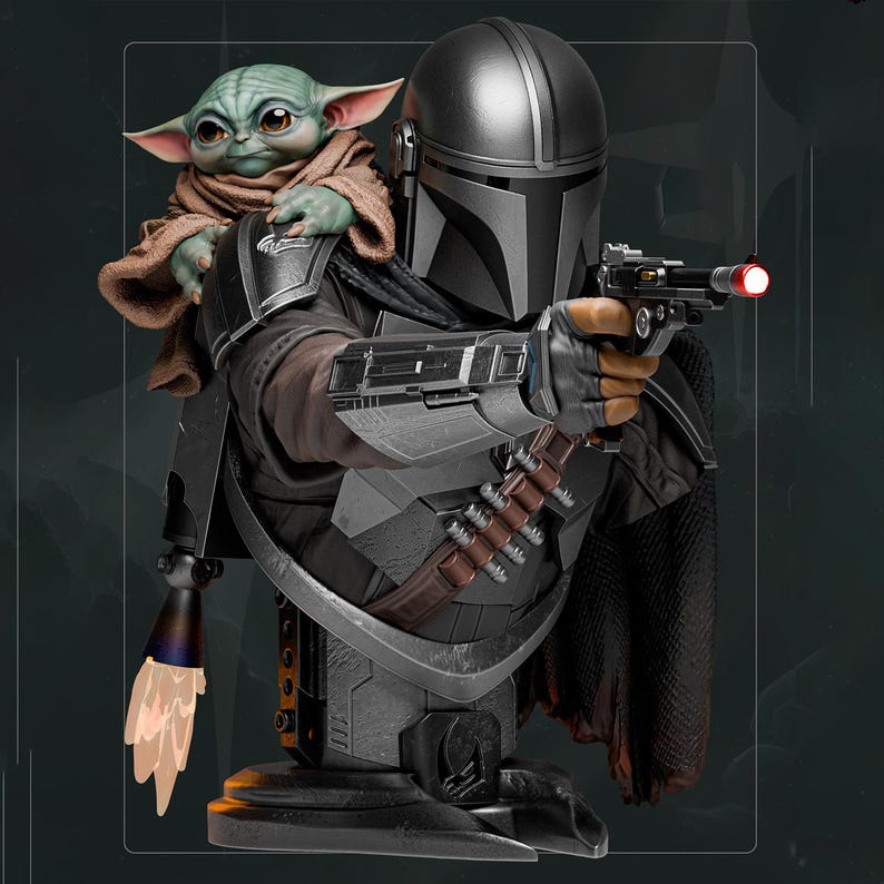 May include: A detailed bust of The Mandalorian holding a blaster, with Grogu perched on his shoulder. The Mandalorian is clad in silver armor with a black cape. Grogu is wrapped in a brown cloth. The bust is a collectible item from the Star Wars franchise.