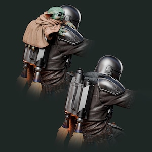 May include: A detailed statue of a character from The Mandalorian, with a helmet and armor, carrying a small green alien with a brown cloak. The statue has a jetpack with blue and orange flames. The background is a dark green.
