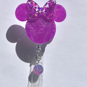 Purple mouse shaped with glitter bow basge reel