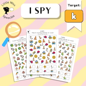 May include: Three "I Spy" activity sheets with colourful illustrations. The sheets feature objects starting with the /k/ sound, food items, and other objects. A magnifying glass and a target letter "k" are also visible.