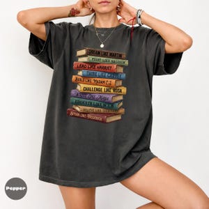 Comfort Colors pepper shirt featuring stacked books with inspirational Black leader quotes graphic, garment dyed soft cotton unisex t-shirt