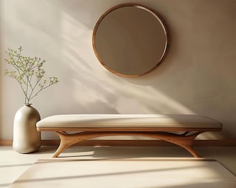 May include: A minimalist interior scene featuring a light-colored bench with a cream-colored cushion, a round wooden-framed mirror, and a beige rug. A vase with greenery sits to the left. The room has a neutral color palette.