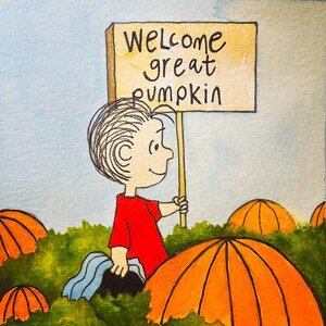 May include: A cartoon illustration of a character holding a sign that says "Welcome great pumpkin". The character is standing in a field of pumpkins.