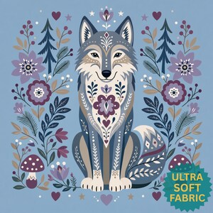 May include: A light blue fabric square featuring a central wolf illustration with intricate floral and geometric patterns in shades of purple, white, and dark blue. The design includes pine trees, mushrooms, and hearts. Text reads: ULTRA SOFT FABRIC.