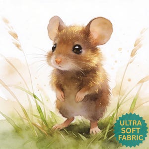 May include: A watercolour illustration of a brown mouse with large ears and dark eyes, standing in a field of green grass and wheat. The mouse is the focal point, with soft, golden fur. The image includes the text "ULTRA SOFT FABRIC".