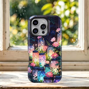 May include: A smartphone case featuring a dark, nocturnal background filled with multiple glowing glass jars. Each jar contains colorful wildflowers and soft, radiant light. Pink and purple blossoms are interspersed among the jars.