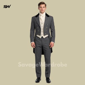 May include: A formal grey suit with a black velvet collar, white waistcoat, and matching trousers. The suit features a double-breasted jacket and a long tailcoat design. The outfit is completed with a white cravat and black dress shoes. The text "Savage Wardrobe" is visible.
