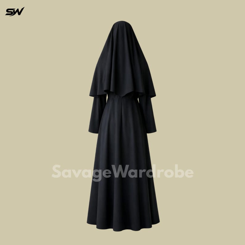 May include: A long, black dress with a matching head covering. The dress has long sleeves and a full skirt. The head covering drapes over the shoulders. The text "SavageWardrobe" is printed on the bottom of the dress.