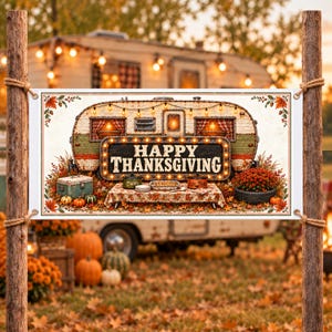 May include: A rectangular banner featuring a vintage camper illustration with the text HAPPY THANKSGIVING. The scene includes a table with food, pumpkins, autumn leaves, and string lights, all suspended between two wooden posts with rope.