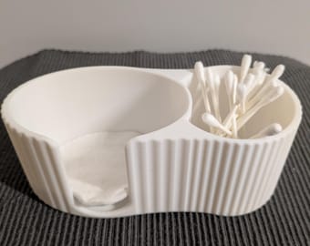 Q-tip and oval makeup remover wipe holder