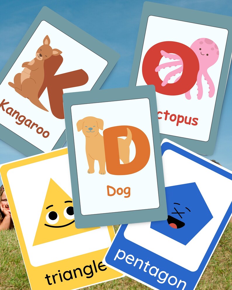 May include: A set of five educational flashcards featuring illustrations and text. Cards display a brown kangaroo with the letter K, a pink octopus with the letter O, a tan dog with the letter D, a yellow triangle, and a blue pentagon with faces.