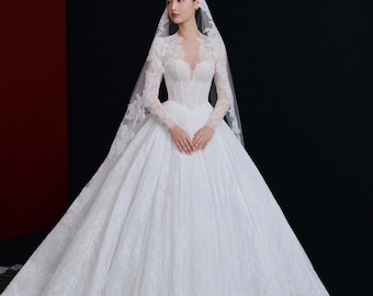 Elegant Long Sleeve Lace Ball Gown with Cathedral Veil