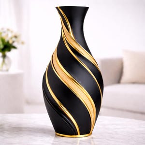 May include: A tall, elegant black vase with gold-colored, swirling accents. The vase has a slender neck and a wide base, with a glossy finish. The gold accents create a striking contrast against the black background, adding a touch of luxury.