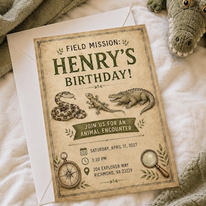May include: A rectangular birthday invitation card with a vintage paper texture, featuring the text FIELD MISSION: HENRY'S BIRTHDAY! and JOIN US FOR AN ANIMAL ENCOUNTER. Illustrations include a snake, lizard, crocodile, compass, and magnifying glass.