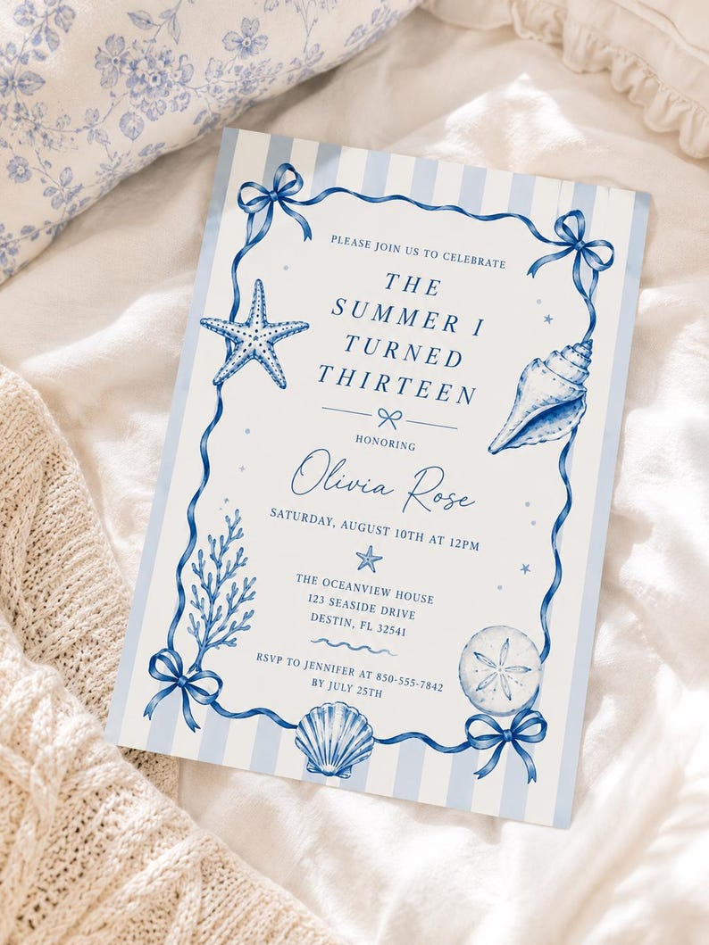May include: A rectangular invitation card with a light blue and white striped background. The border features blue ribbons with bows, a starfish, a seashell, coral, and a sand dollar. Text reads: PLEASE JOIN US TO CELEBRATE THE SUMMER I TURNED THIRTEEN HONORING Olivia Rose SATURDAY, AUGUST 10TH AT 12PM THE OCEANVIEW HOUSE 123 SEASIDE DRIVE DESTIN, FL 32541 RSVP TO JENNIFER AT 850-555-7842 BY JULY 25TH.