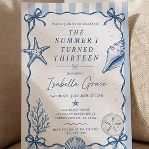 May include: A rectangular invitation card featuring a light blue and white vertical striped background. The border consists of blue ribbons tied in bows at the corners, decorated with illustrations of a starfish, seashell, coral, and sand dollar.