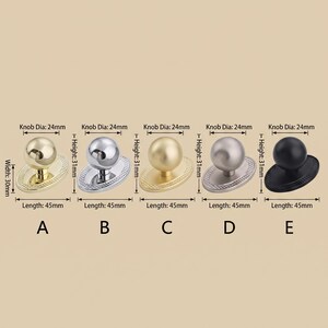 May include: Five round cabinet knobs with oval backplates labeled A through E. Each knob has a 24mm diameter, 31mm height, 45mm length, and 30mm width. Finishes include polished gold, chrome, brushed gold, brushed nickel, and matte black.