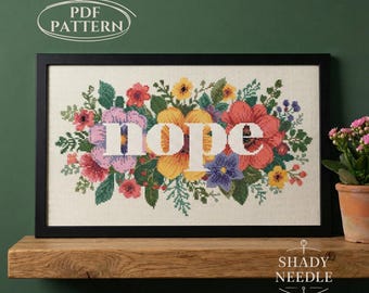 Funny cross stitch PDF pattern with NOPE text. Subversive embroidery chart for instant download. Xstitch sassy design on floral background