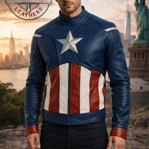 May include: A blue, red, and white leather jacket with a star emblem. The jacket features a design inspired by a superhero, with a zipper closure and red cuffs. The background shows a cityscape and the Statue of Liberty.