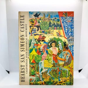 May include: A colorful illustration of Hearst San Simeon Castle, a California State Historical Monument, with a whimsical depiction of a knight on horseback. The illustration is by Kaye Welch Hansen.