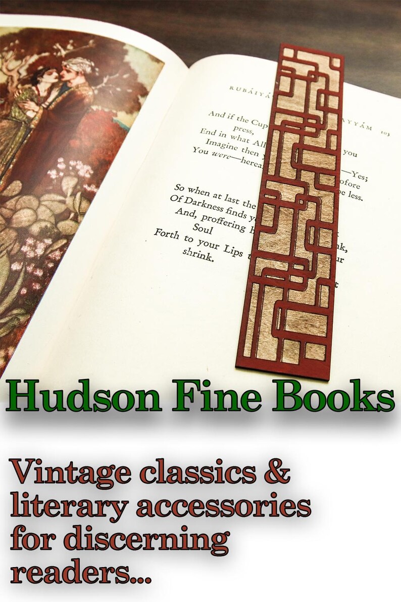 May include: A wooden bookmark with a geometric design in shades of brown and red. The bookmark is on top of an open book with text about the "Cup" and "Darkness". The text below the bookmark reads "Hudson Fine Books Vintage classics & literary accessories for discerning readers..."