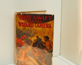 Tom Swift and His Wizard Camera hardcover in original dust jacket [1924] First edition, later printing Children's series book #14