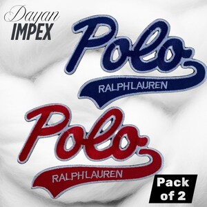 May include: Two embroidered Polo Ralph Lauren patches. One patch is navy blue with white stitching, and the other is red with white stitching. The patches are on a white, fluffy background. The text "Dayan IMPEX" is in the upper left corner, and "Pack of 2" is in the lower right corner.