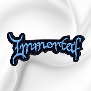 Immortal White Logo Embroidered Patch (3.75" x 1.75") – Iron On Sew On Band