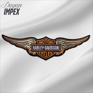 May include: Embroidered Harley-Davidson Cycles patch featuring a winged logo in black, orange, and cream colors. The patch has the text "MOTOR HARLEY-DAVIDSON CYCLES" in a rectangular frame. The patch is on a white background.