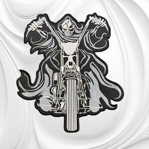 May include: An embroidered patch featuring a grim reaper figure riding a motorcycle. The design is rendered in black, white, and gray thread, depicting the reaper with a skull face and flowing robes, gripping the handlebars of a chopper-style bike.