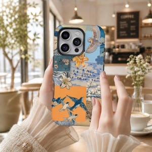 May include: A smartphone case featuring a collage design with various illustrations including an owl in flight, blue birds, orange and white lilies, and a sky scene with birds on wires. The colour palette includes shades of blue, orange, and white.