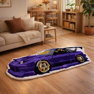 May include: A purple car-shaped rug with yellow and black detailing. The rug is laid on a wooden floor in a living room. The car design has a detailed outline and a white border.