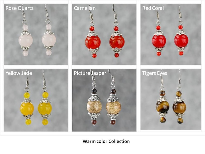May include: A collection of warm-colored gemstone earrings. The earrings feature a variety of stones, including rose quartz, carnelian, red coral, yellow jade, picture jasper, and tiger's eye. Each pair of earrings is made with silver-toned metal and features a round gemstone bead.