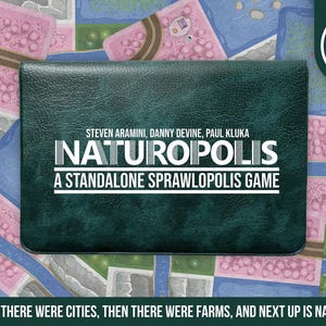 May include: The board game "Naturoplis" is displayed, featuring a dark green cover with white text. The game's title and author names are visible. The game is for 1-4 players. The background shows a colorful game board with roads, rivers, and pink fields.