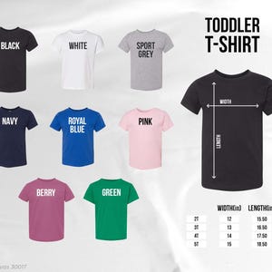 May include: A collection of toddler t-shirts in various colors, including black, white, navy, royal blue, pink, berry, and green. The image also shows a black t-shirt with width and length measurements in inches for sizes 2T to 5T. Text on the image reads "TODDLER T-SHIRT".