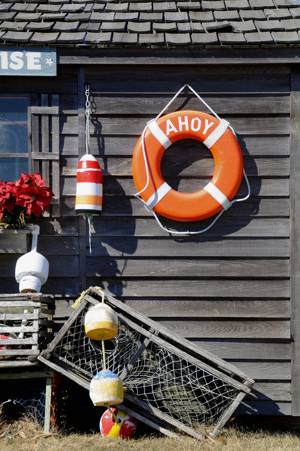 Nautical decorations on the outside wall of a beach cottage Etsy