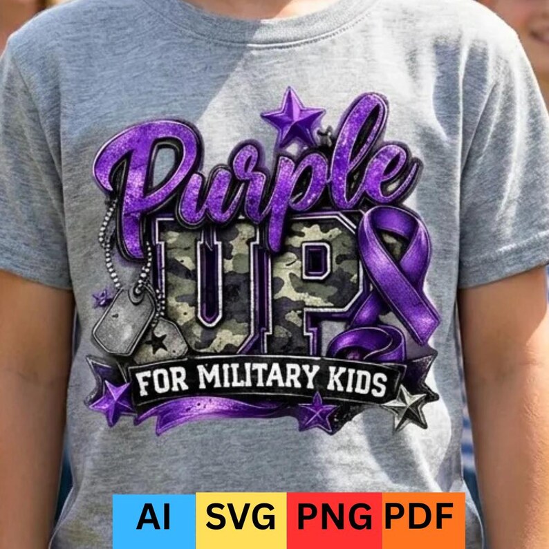 May include: A grey t-shirt featuring a purple graphic with the words "Purple Up" and "UP" in camouflage print. The text "FOR MILITARY KIDS" is below. Includes purple ribbon and star accents.