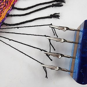 Handcrafted Fringe Twister made of Renewable Acacia Wood and Accented with Sapphire Blue Resin