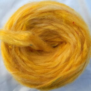 Kid-Grade Mohair Roving Blend with Merino Wool and Sari Silk in A Rich Golden Yellow. This Blend is Incredibly Soft & a Real Treat to Spin!