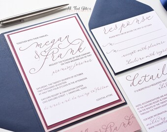 May include: A wedding invitation suite with a navy blue, burgundy, and blush pink color scheme. The invitation features the couple's names, "Megan & Frank", in elegant calligraphy. The RSVP card includes a request to reply by the first of October. The details card provides information about the wedding venue and accommodations.
