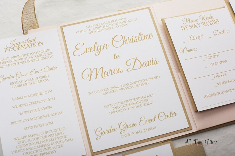 May include: A white wedding invitation with gold lettering. The invitation is for the wedding of Evelyn Christine and Marco Davis. The wedding will be held on Sunday, July 19, 2015 at 5:00 PM at the Garden Grove Event Center in Carbondale, Illinois.