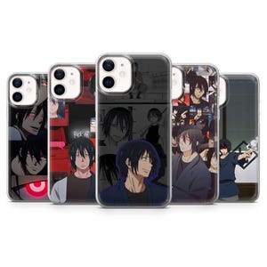 May include: A collection of five clear phone cases featuring anime character art. The designs include various images of a character with black hair and red eyes, with some cases displaying text.