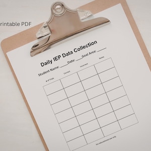 May include: A clipboard holding a sheet labelled "Daily IEP Data Collection." The document features spaces for student details, date, and goal area, plus a grid for data recording. The words "Printable PDF" are in the upper left corner.
